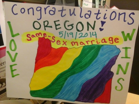 Members of the QRC constructed a sign after hearing the news about marriage equality in Oregon. (Photo cred: The Siskiyou)