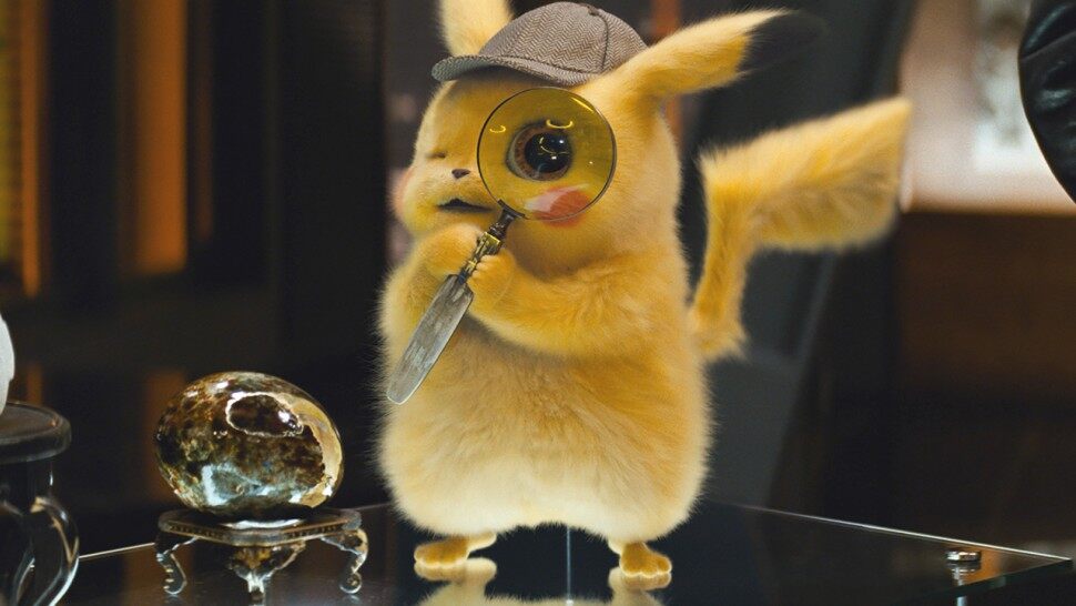 Computer graphic render of the character pikachu in a detective hat holding a magnifying glass.