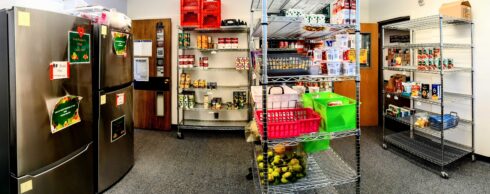 Shelves of packaged food arranged on shelves at Southern Oregon University's Food Pantry