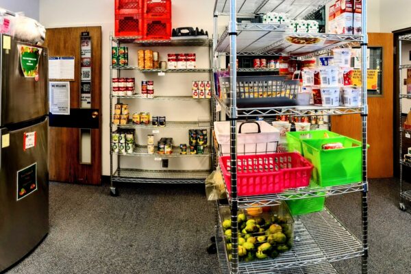Shelves of packaged food arranged on shelves at Southern Oregon University's Food Pantry