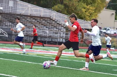 SOU midfielder Danny Palomino dribbles a soccer ball across the field at Raider Stadium