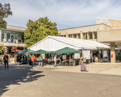 Students gather in the courtyard of the Stevenson Union on Southern Oregon University's Ashland Campus for the Meet Ashland & Beyond Fair, hosted by the University's Office of Student Belonging and Engagement