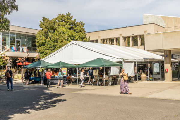 Students gather in the courtyard of the Stevenson Union on Southern Oregon University's Ashland Campus for the Meet Ashland & Beyond Fair, hosted by the University's Office of Student Belonging and Engagement